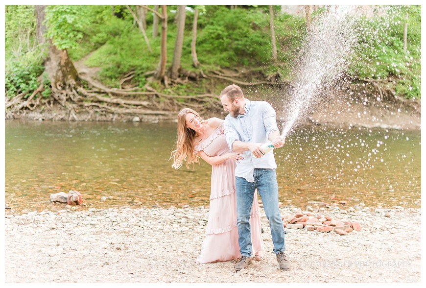 Cat-Granger-Photography-Bethany-Tyler-Patapsco-Valley-State-Park-Engagement-Spring-2021-champagne-pop-pink-dress-blue-shirt-boho-dress