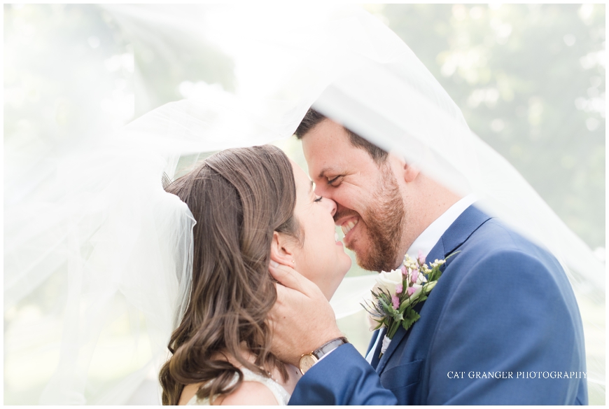 bluebird manor bride and groom photos with veil