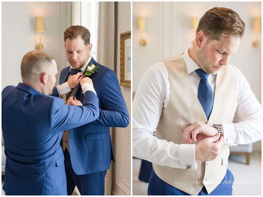 groom getting ready indoors blue suit champagne vest