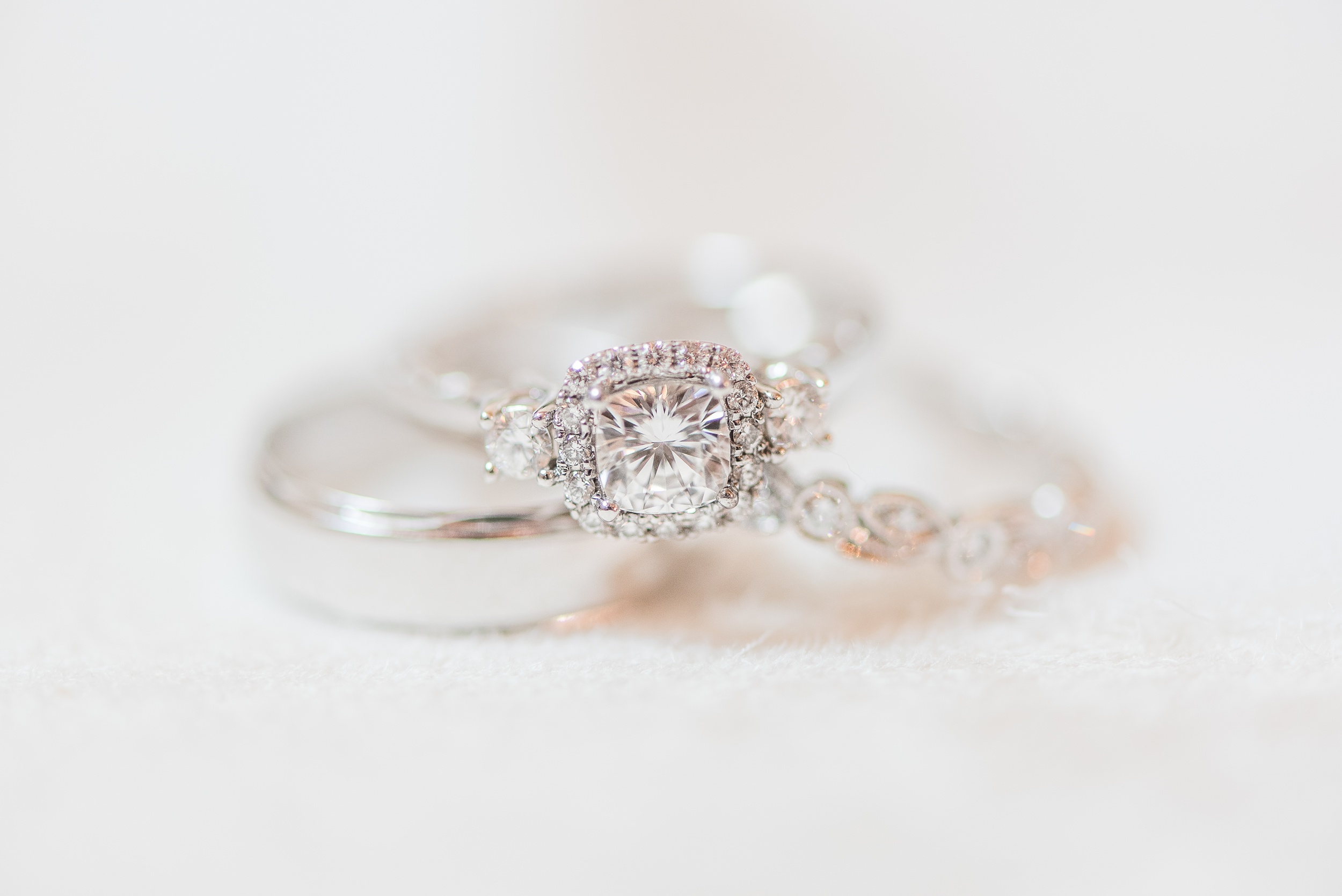 Details of wedding rings on a table at an Appleford Estate Wedding