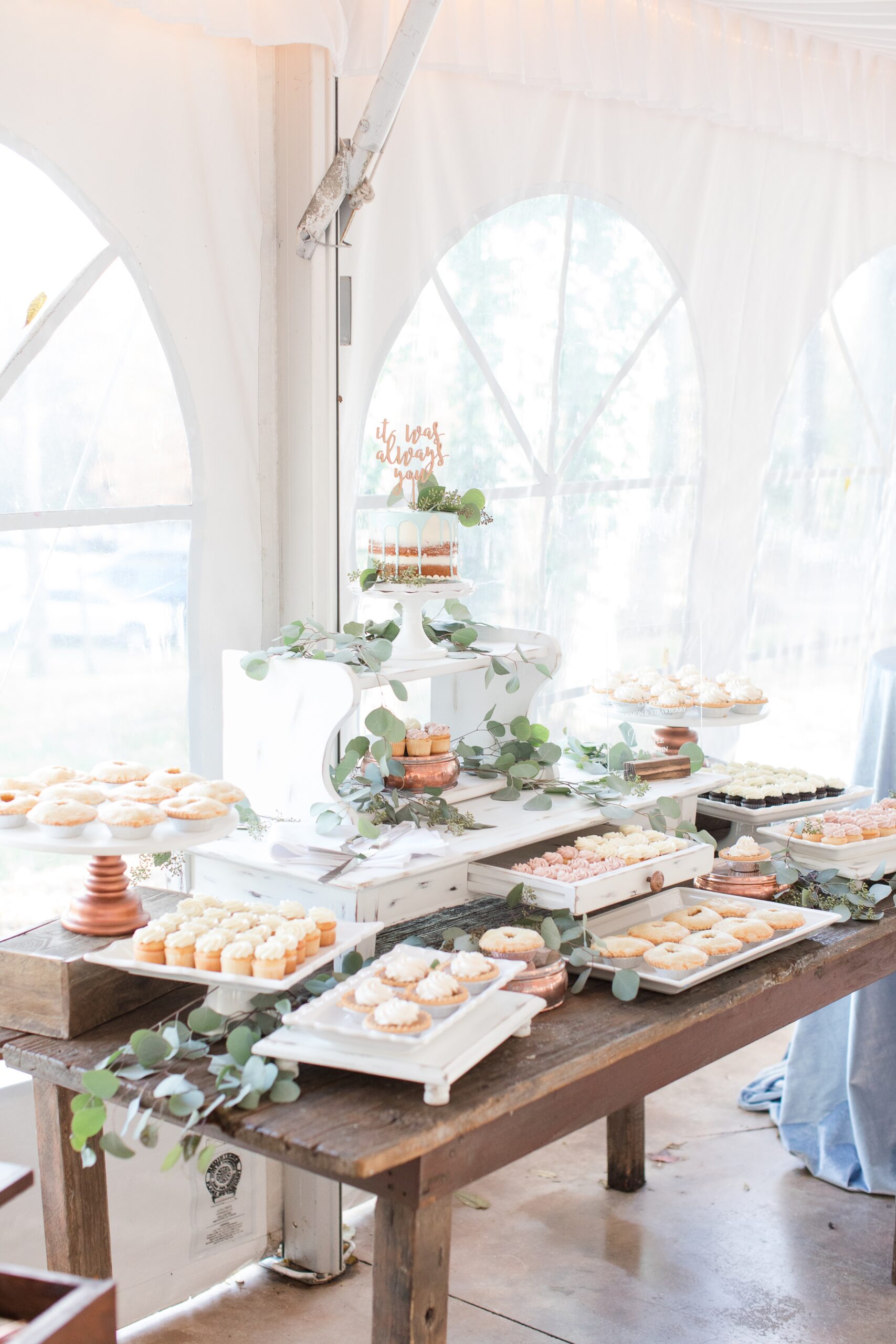 Details of a desert station on a rustic wooden table at a tent Historic Shady Lane Wedding reception