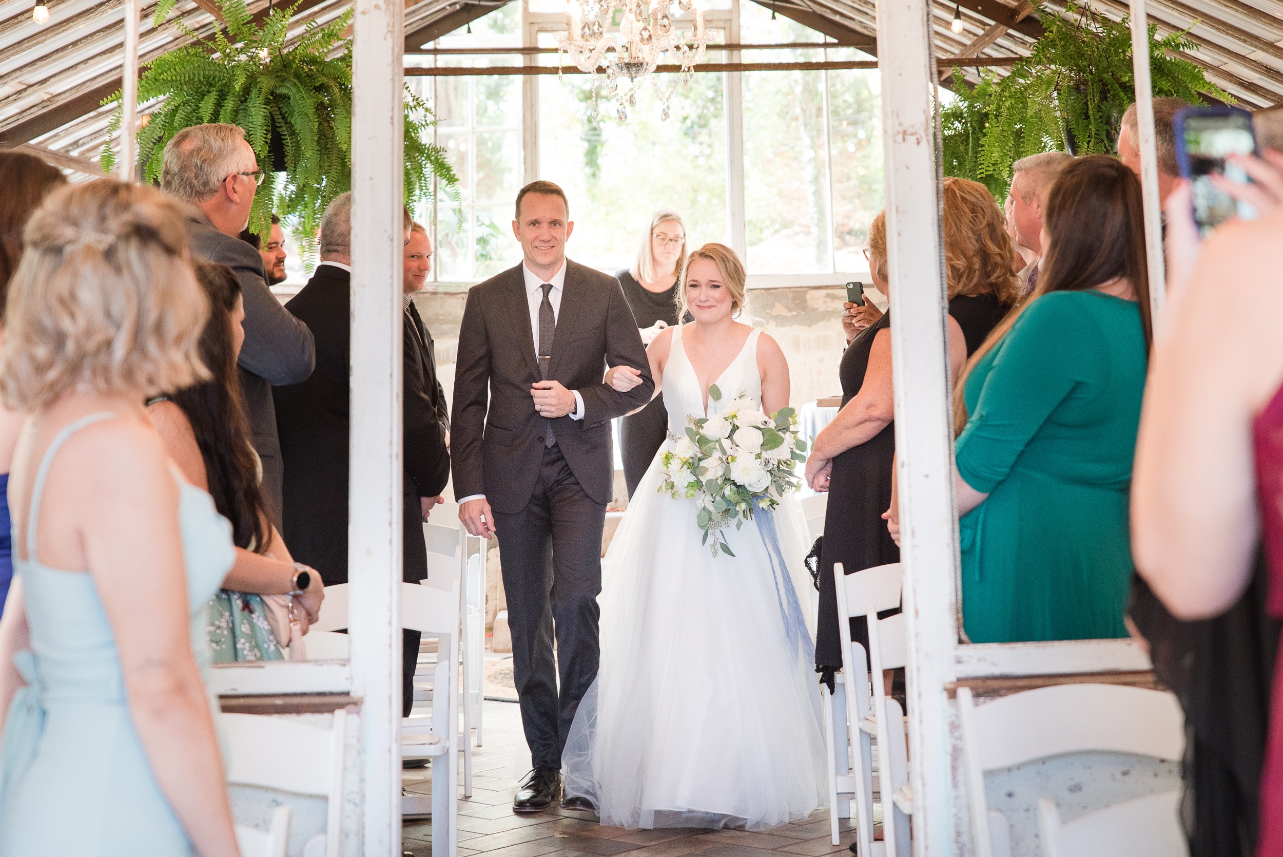 A father walks his close to tears daughter down the aisle for for Historic Shady Lane Wedding