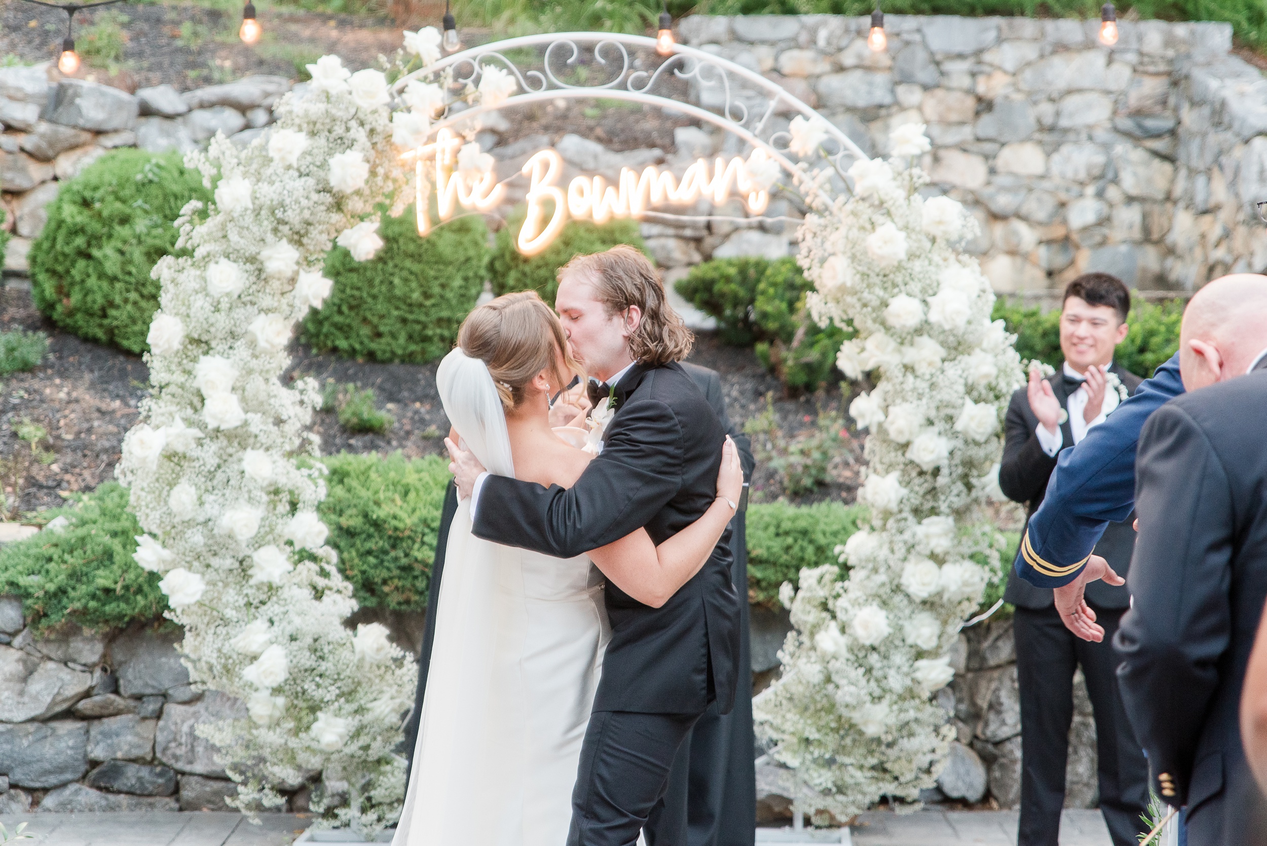 Newlyweds kiss at the end of their wedding ceremony at Milton Ridge Wedding venue