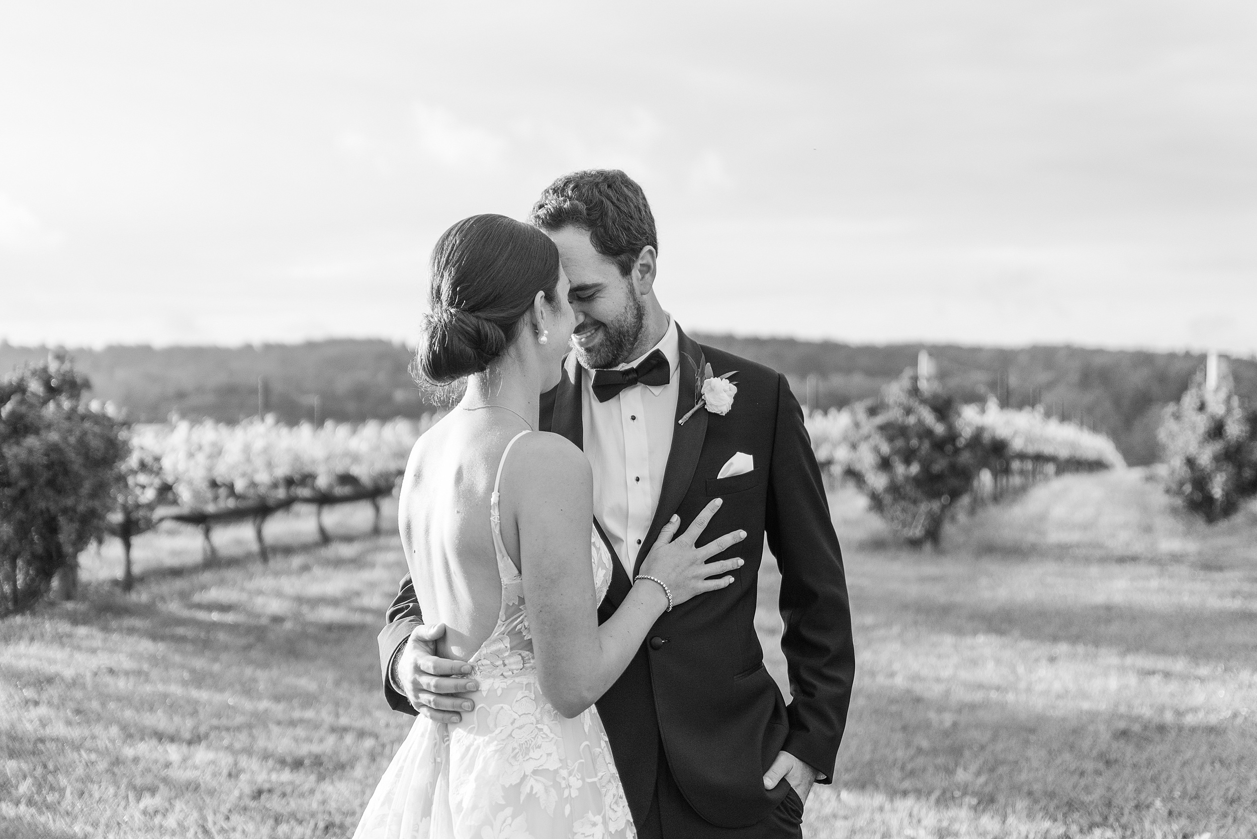 Newlyweds stand out among the vineyards at their wedding