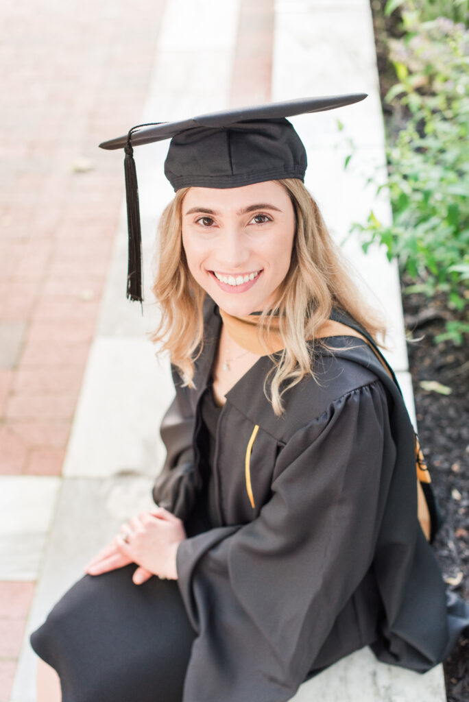 close up of grad female with cap and gown john hopkins